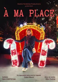 Photo d'une femme assise sur un trône rouge, blanc et doré